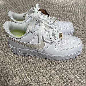 NWT Women's Nike Air Force 1 ‘07 with tan swoosh, size 8.5